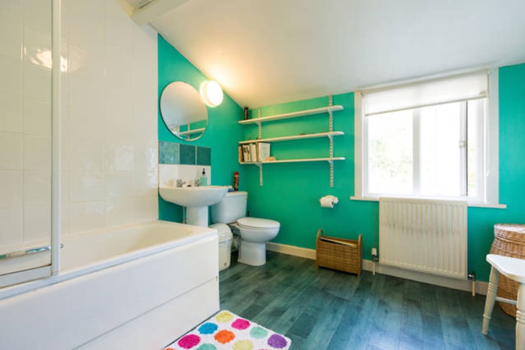 large bathroom with shower and bath