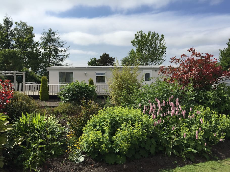 Secluded but not isolated, set in our beautiful farmhouse garden, on the very edge of our village