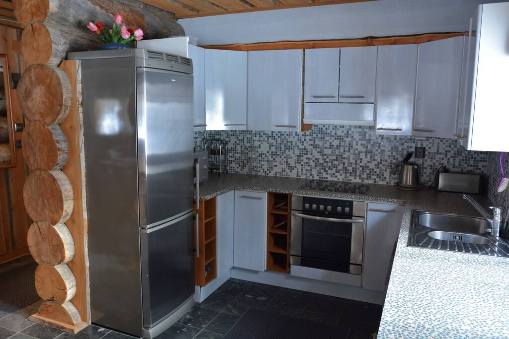 Full equipped kitchen offers super possibilities for cooking .