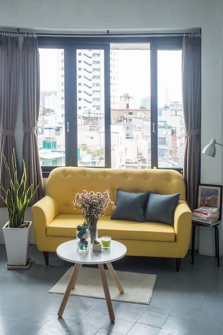 Comfy living room with load of lights during the day time, and panorama view to enjoy the greatest sunset when it comes