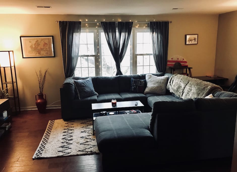 Living room with TV and open desk