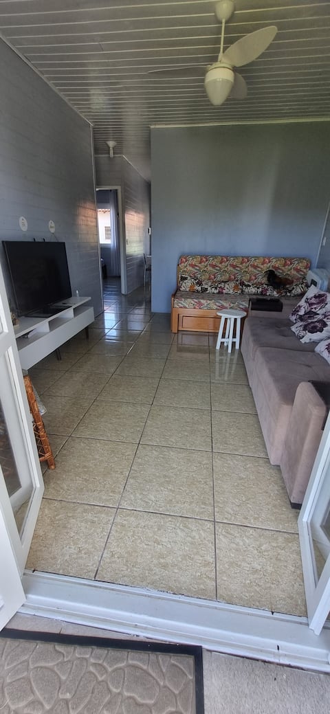 Successful Airbnb property: gray house in Capão Da Canoa