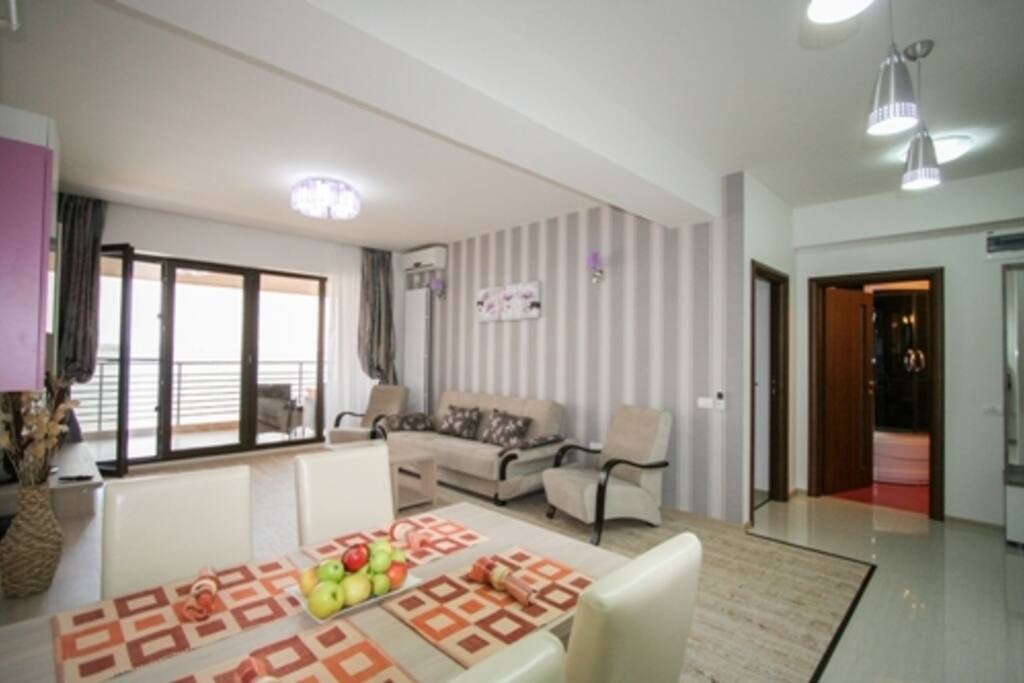 Besides all the facilities, the living room offers an unforgettable view of the lake Siutghiol.