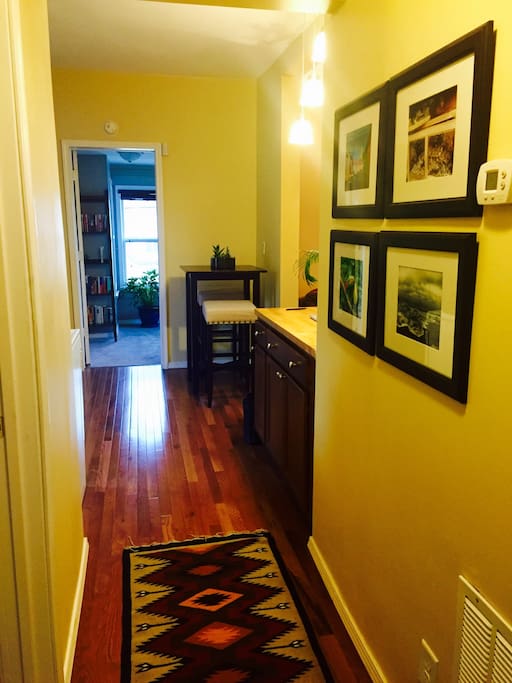 Hallway with lots of photos from my travel