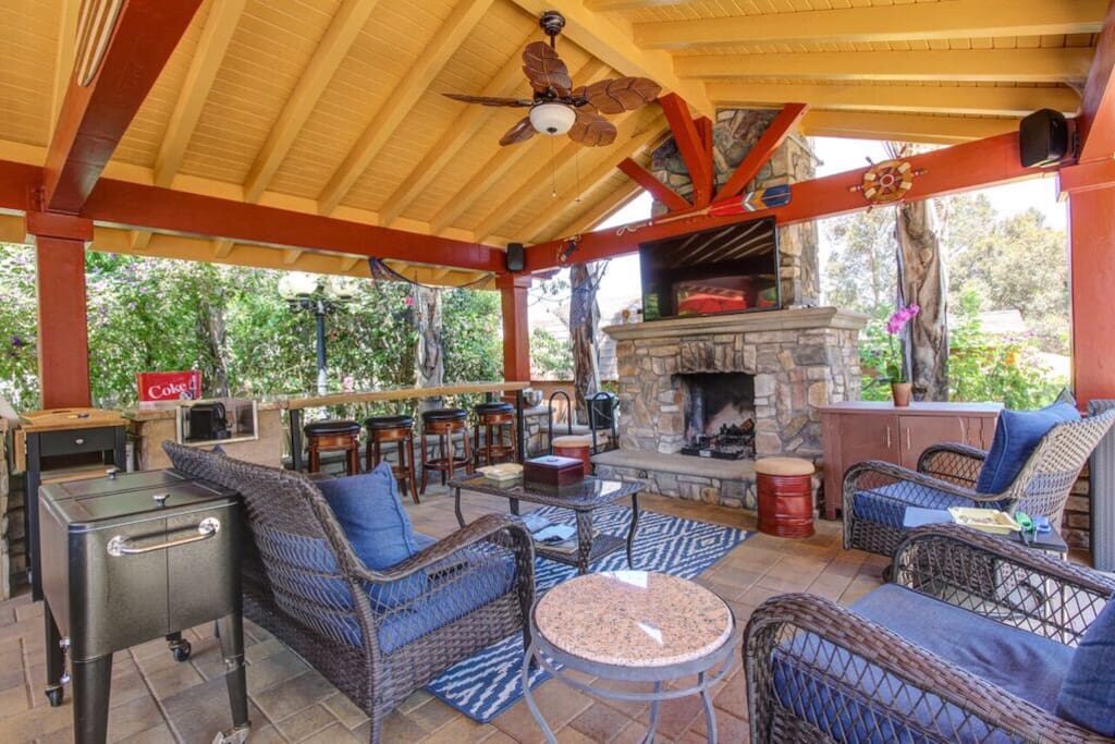Deck with full kitchen, outdoor fireplace & TV