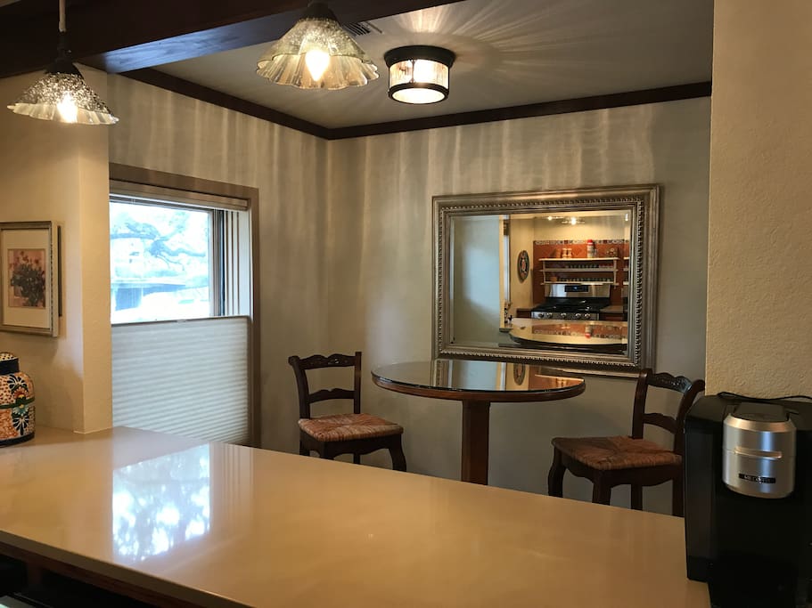 Dining nook opens to the kitchen
