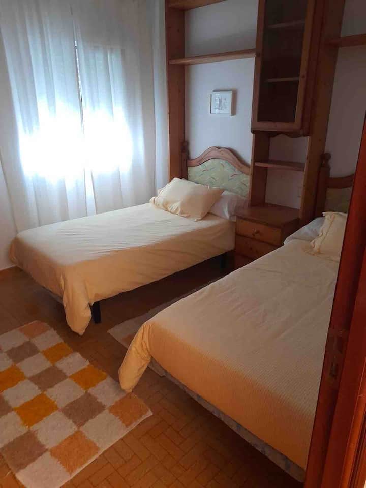 Children's room with two twin beds.