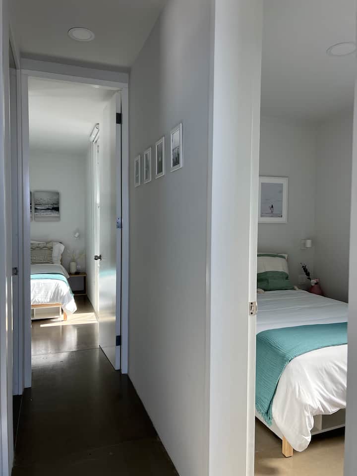 View of the hallway with the stationary doors open.