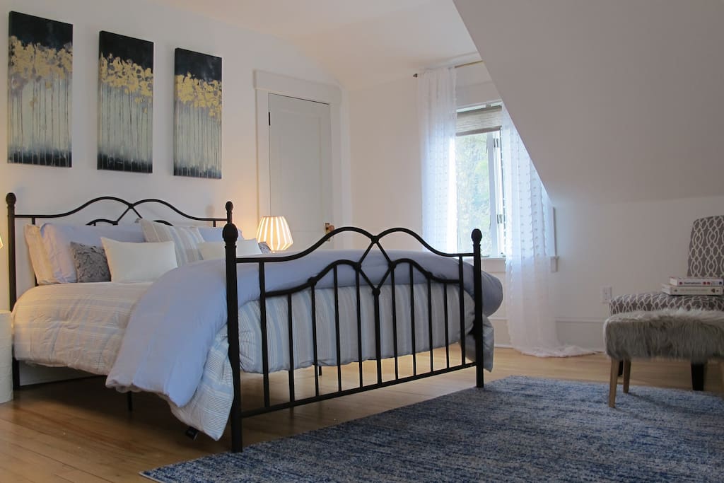 A queen bed, built in closet & incredible natural light with views over Penobscot Bay and wildflower meadow... Sounds a lot better than a motel right!
