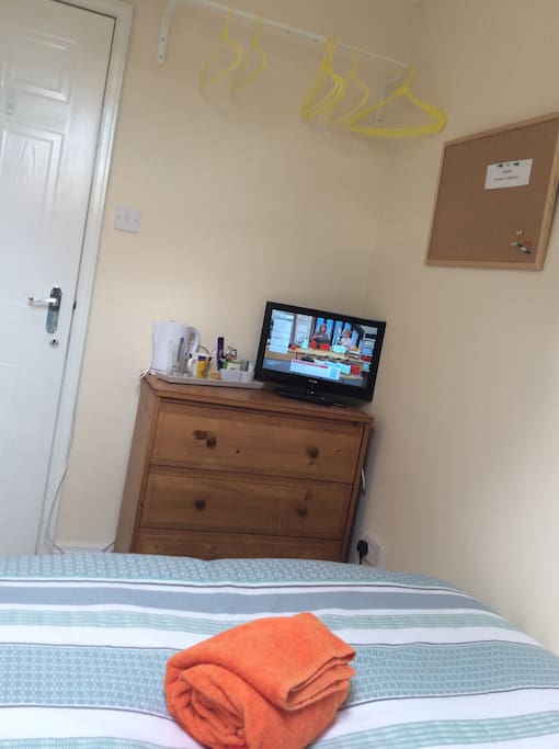 Personal TV, tea, coffee, and hanging space.