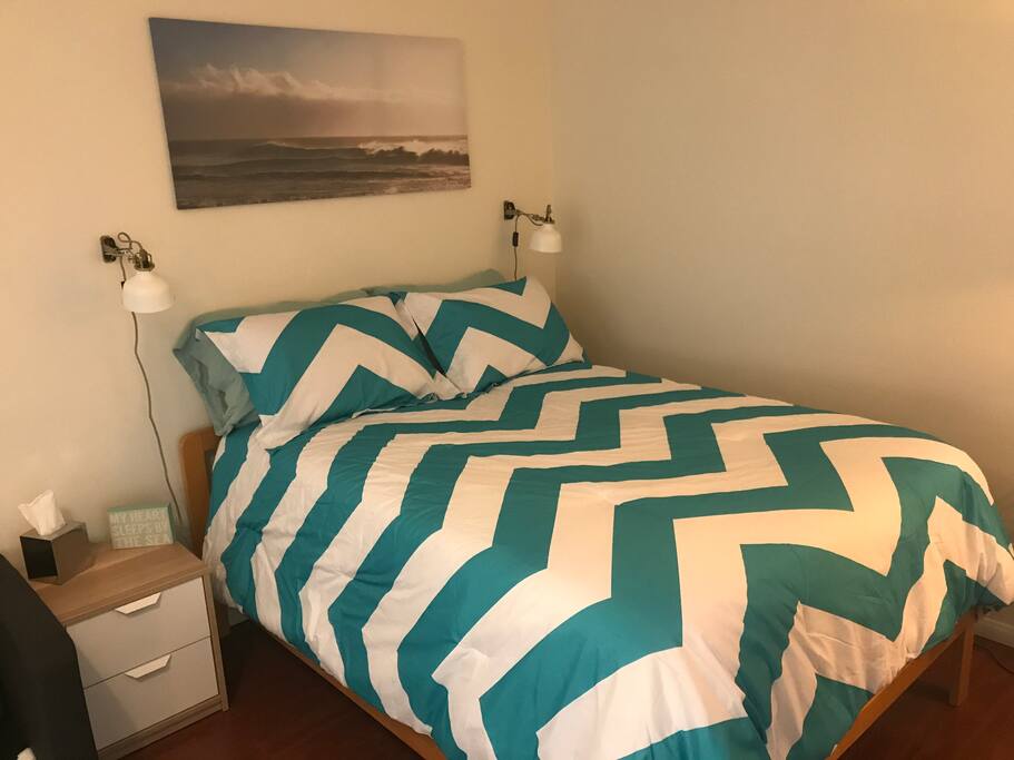 Full size bed with tempurpedic foam topper.