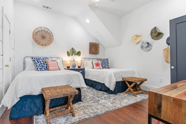 This is the second bedroom downstairs, named Rhett. It sleeps 4 on two full size beds. 