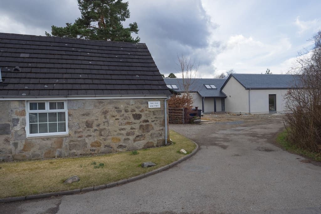 The Old Smithy is on the left and newly built Riverside Lodge is on the right of the photo. You can see how close they are.