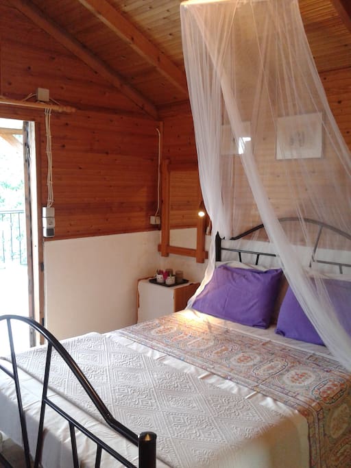 Room with one double bed.