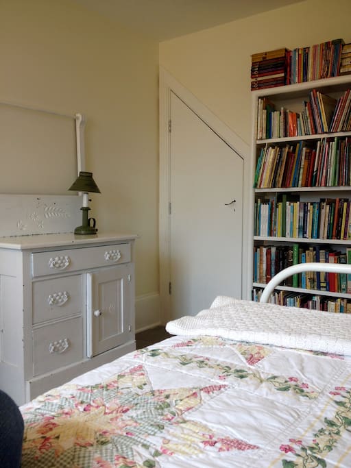 Teeny tiny closet in tiny room.