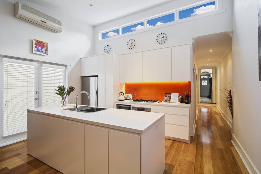 Well appointed kitchen with gas cooking and dishwasher.