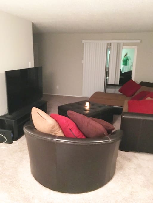 Living Room-65 inch smart TV.. Sectional & Love Seat