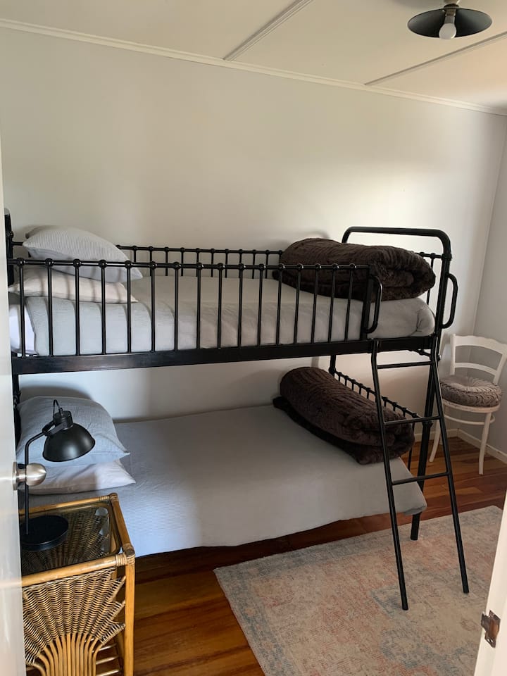 Second bedroom with single bunk bed 