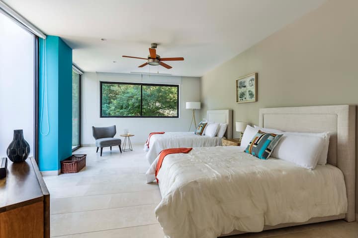 Segundo dormitorio con dos camas tamaño queen