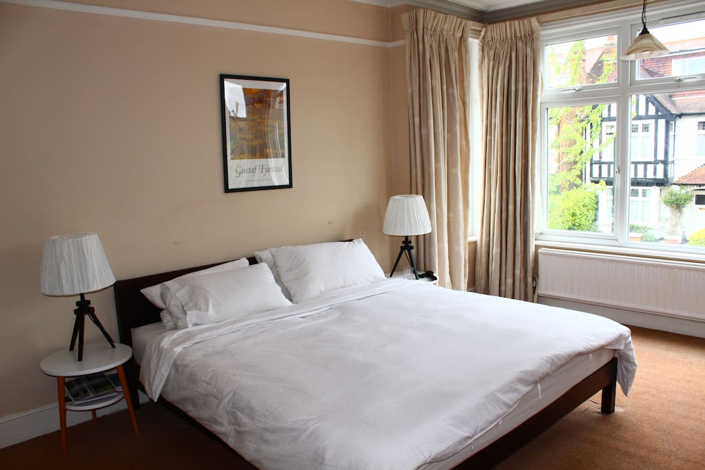 Master bedroom on 1st floor, sunny and bright, with super king size bed