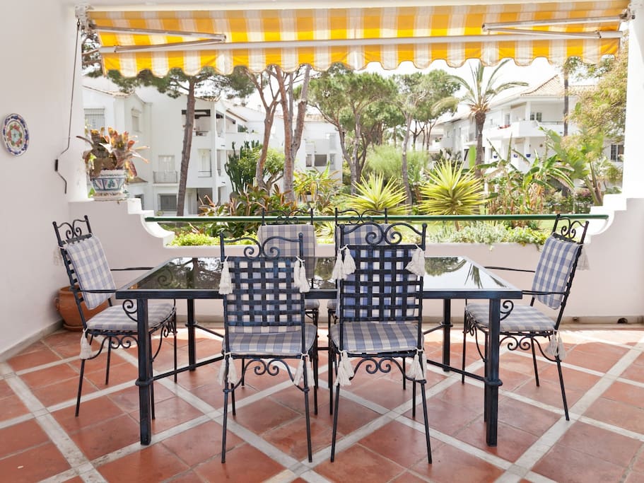 Dining terrace for eight persons just off the lounge of the apartment