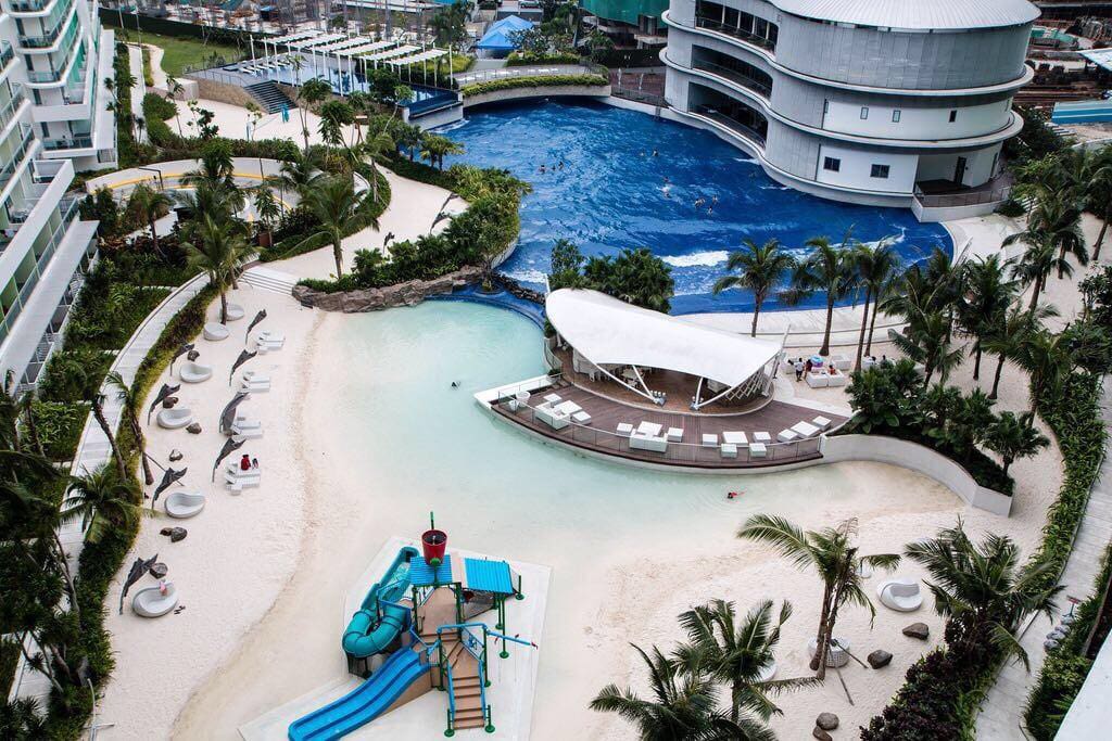 WAVE POOL AND MAN MADE BEACH