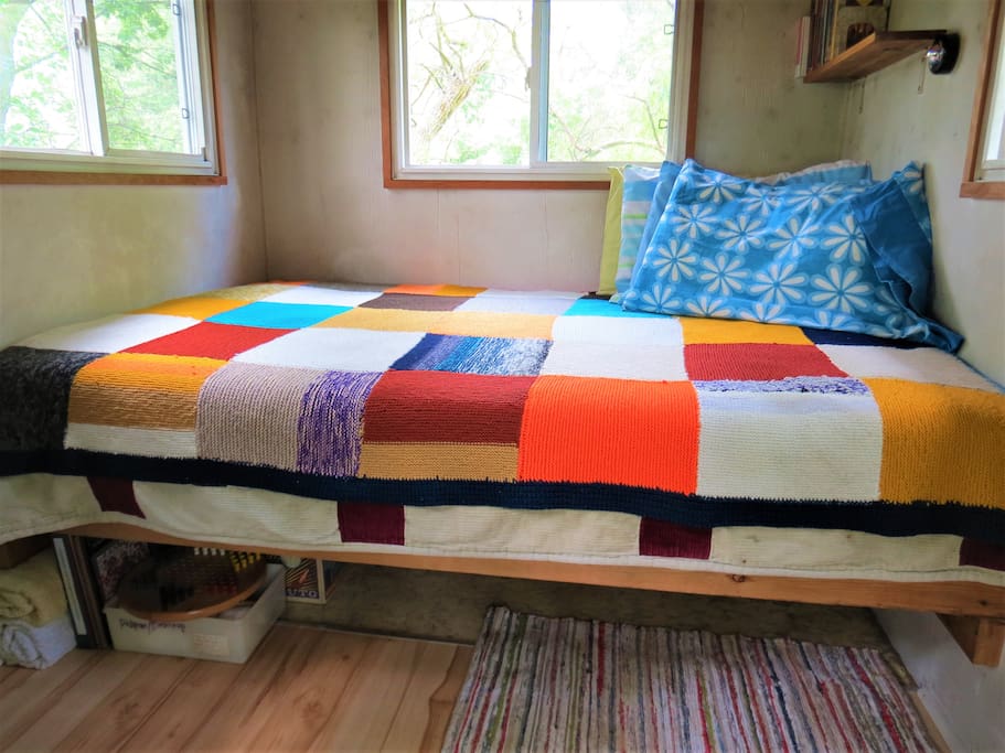 NEW: A 6" gel memory foam mattress for the 4' x 6' sleeping platform is made up with sheets, pillows and extra blankets.