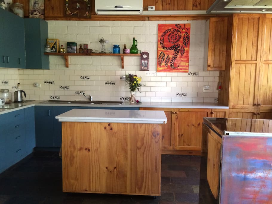 Large open kitchen which accommodates many people at once.