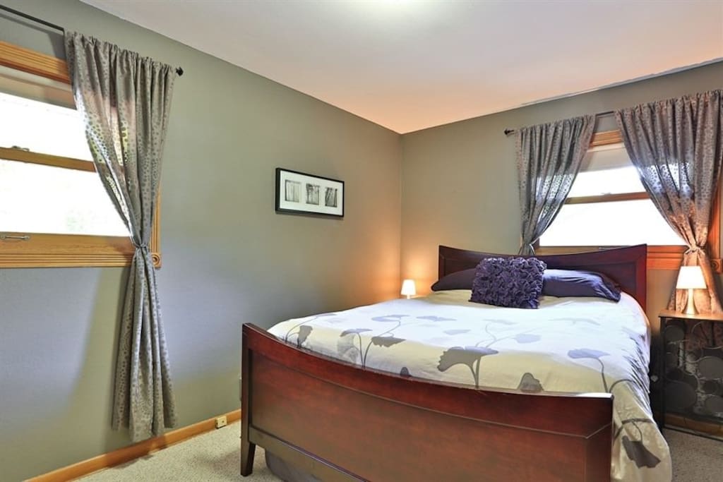 Main Bedroom with queen bed, there's another bedroom adjacent with the single bed.