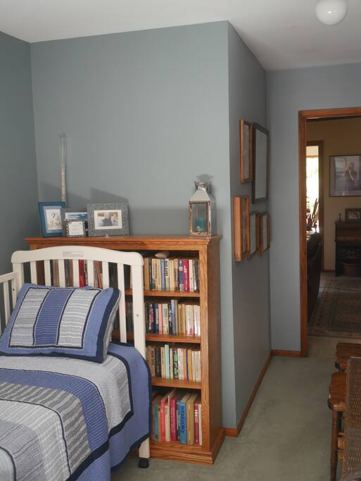 Downstairs master with open crib.