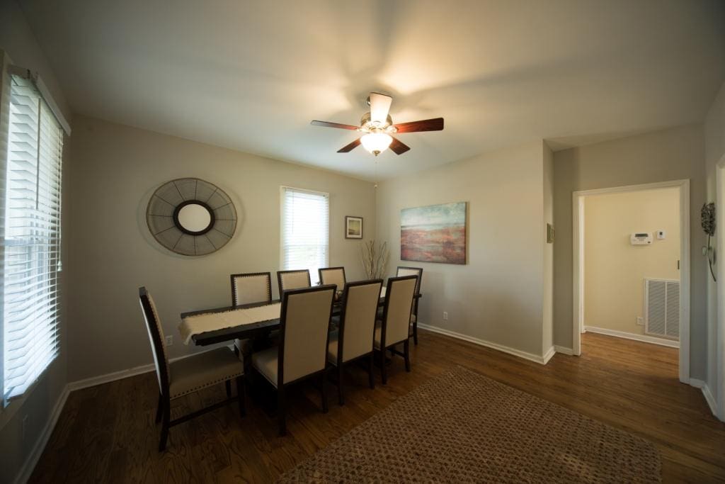 Just inside the front door is the dining room, which seats 8 comfortably at the table.