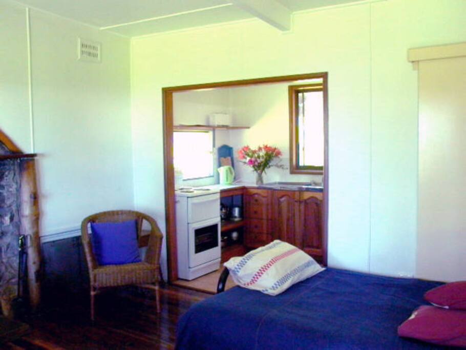 Sofa bed and kitchen