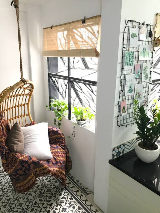 Our relaxing hanging bamboo chair to get soaked a little in the sunlight.