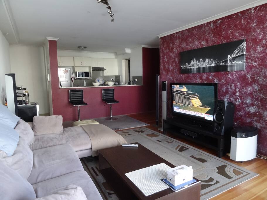 Living room - Fully equipped open plan kitchen.