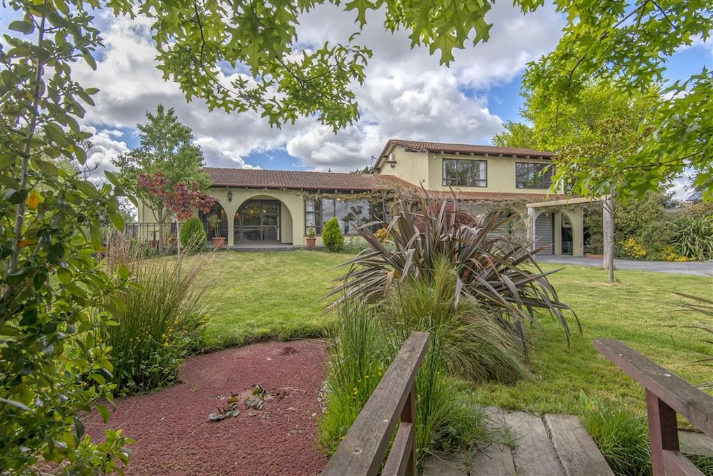 The view of the house from the pond