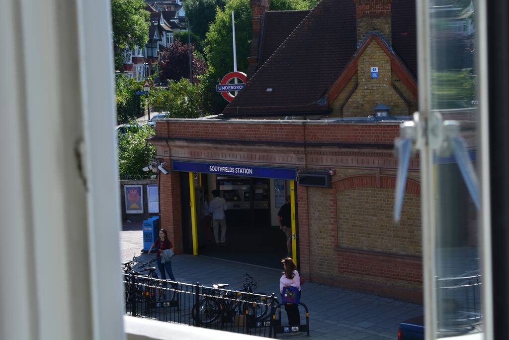 Directly opposite Southfields tube station