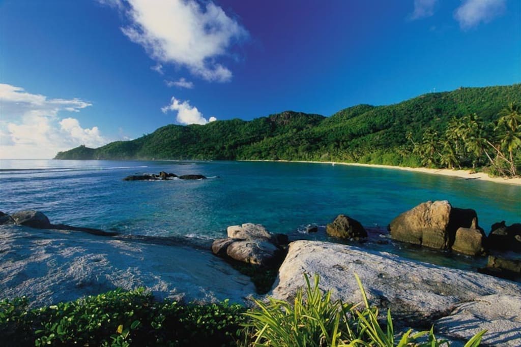 The gorgeous bay of Anse Forbans just steps from your private chalet.