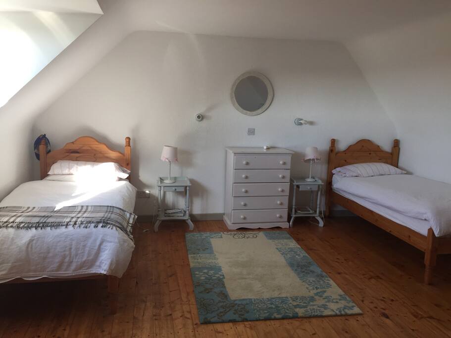 2 single and one double bed in this room