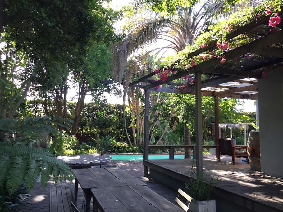 Outdoor deck leads to pool