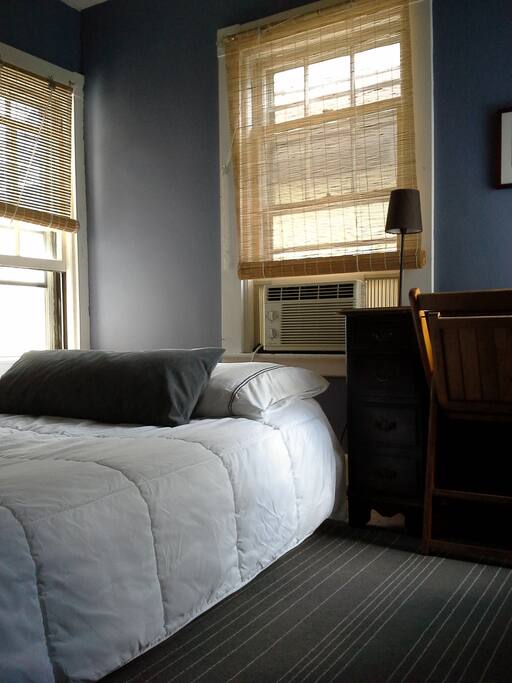 This is a second-floor bedroom accessible by stairs.