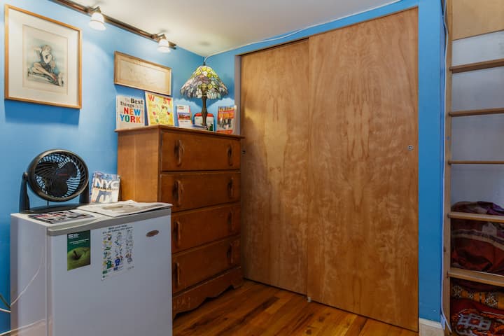 Here is your fully private room. You have half the closet to use to hang up your nice things in. You also have your own refrigerator.