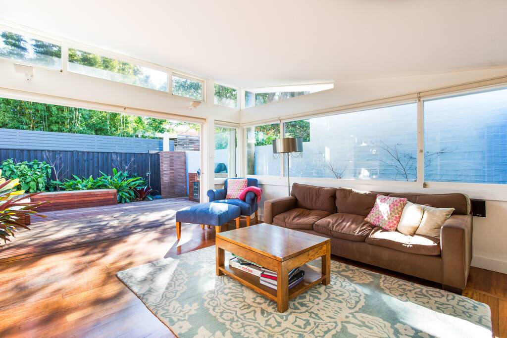 Lounge room opening onto the courtyard and BBQ area