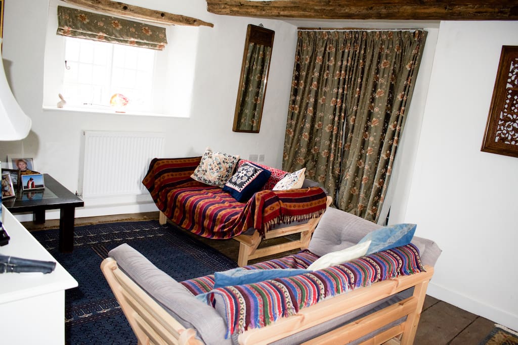 Upstairs living room with single sofa beds.