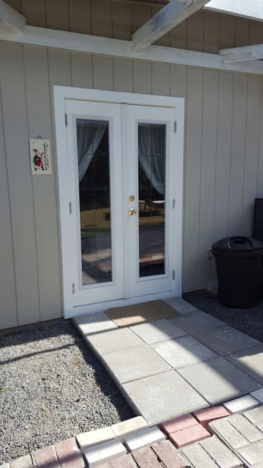 Follow the garden path to this separate private entrance in back.