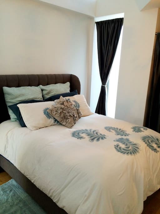 Private bedroom with access to outdoor patio.