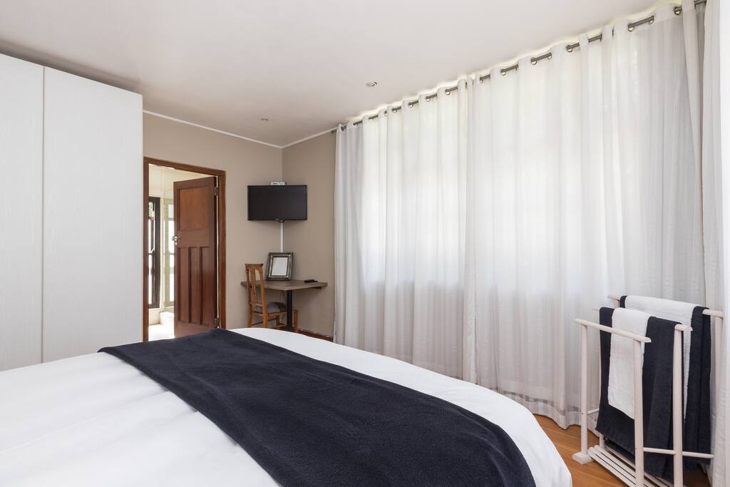Main bedroom with DSTV and work station
