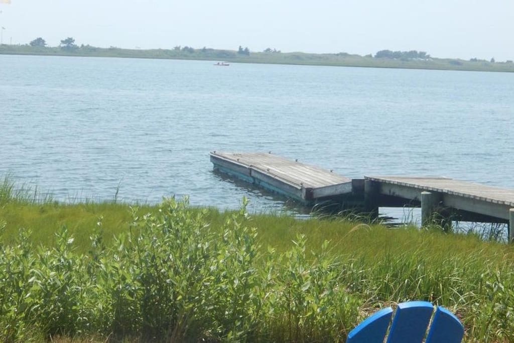 Your view of Lewis Pond from our back yard in Summer time. Sea Gull Beach is in the background.