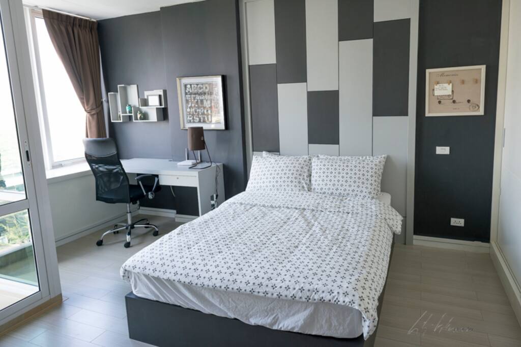 Queen Size Bed and a custom built desk and office chair.