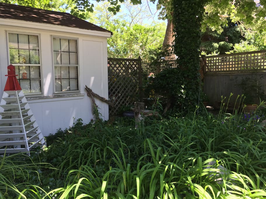 You enter through a garden