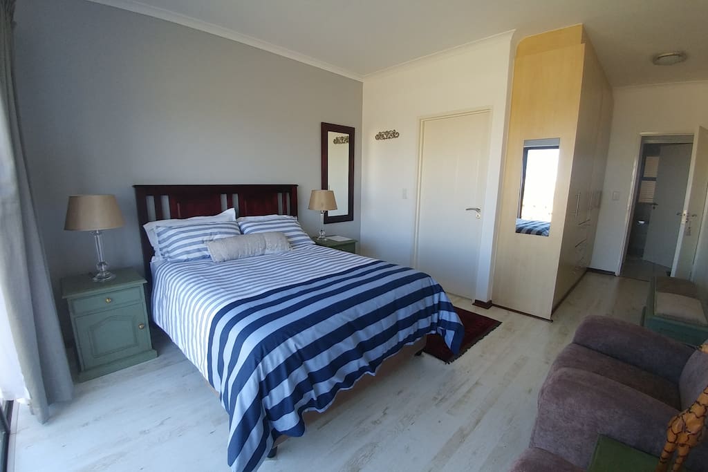 Main bedroom with en suite and sliding door.